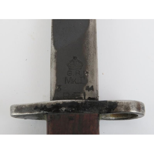 267 - A WWII British Indian army bayonet with scabbard. Ricasso struck with crown above ‘G.R.I. MkII* R.F.... 