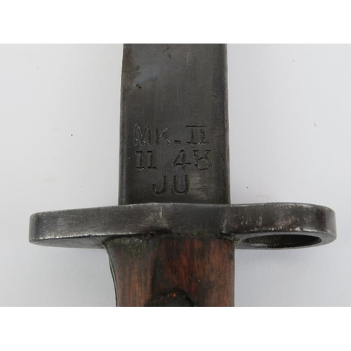 268 - A WWII British Indian army bayonet with scabbard. Ricasso struck with crown above ‘G.R.I. MkII* JU.’... 