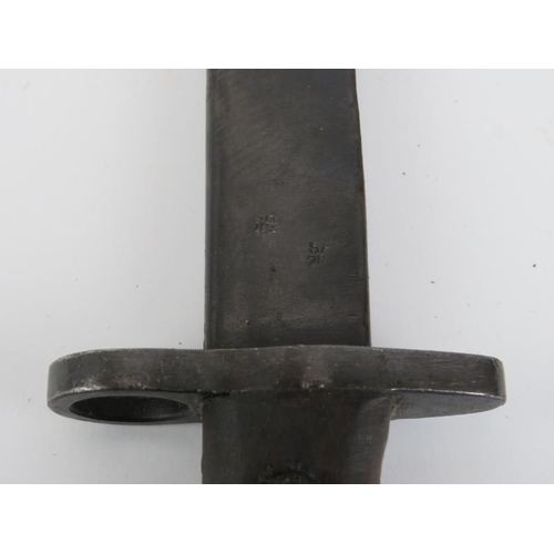 268 - A WWII British Indian army bayonet with scabbard. Ricasso struck with crown above ‘G.R.I. MkII* JU.’... 