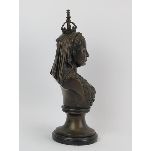 27 - A large bronze bust of Queen Victoria, 20th century. Mounted on a black marble base. 40.5 cm height.... 