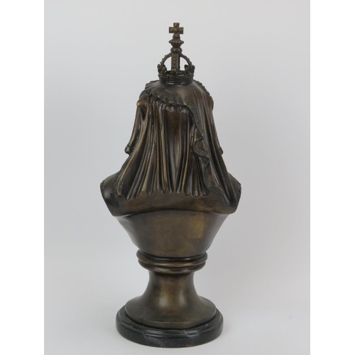 27 - A large bronze bust of Queen Victoria, 20th century. Mounted on a black marble base. 40.5 cm height.... 