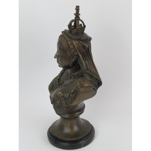 27 - A large bronze bust of Queen Victoria, 20th century. Mounted on a black marble base. 40.5 cm height.... 