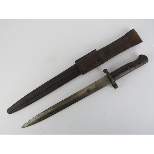 270 - A British 1903 pattern bayonet with leather scabbard. Ricasso struck ‘Wilkinson London’. 42.5 cm len... 