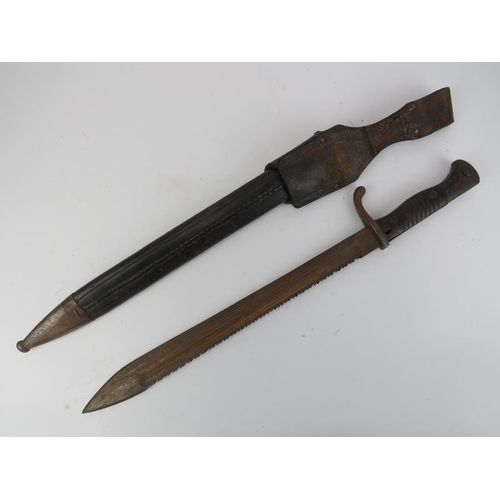 271 - A WWI Imperial German 'Butchers' sawback K98 bayonet and scabbard. Ricasso struck ‘Waffenfabrik Maus... 