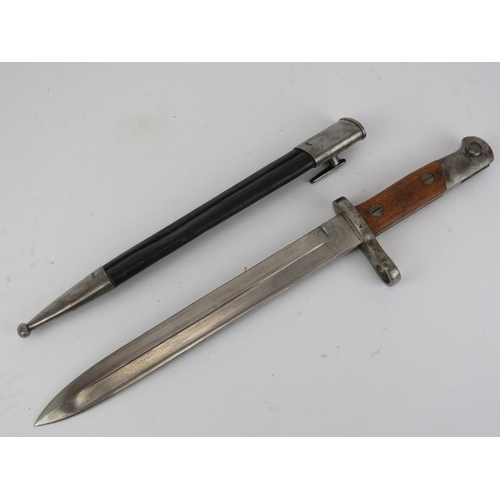 272 - A Spanish M1893 Mauser bayonet and scabbard. Ricasso marked ‘Artilleria Fca De Toledo 1900’. 40.8 cm... 