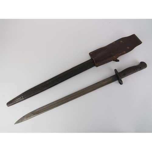 277 - A WW1 English Lee-Enfield Pattern 1907 Bayonet with scabbard and frog. Marks to the ricasso. 57.7 cm... 