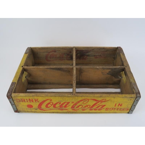 31 - A vintage painted wood Coca Cola ‘Chattanooga Cases’ bottle crate, dated 1960. With metal mounted co... 