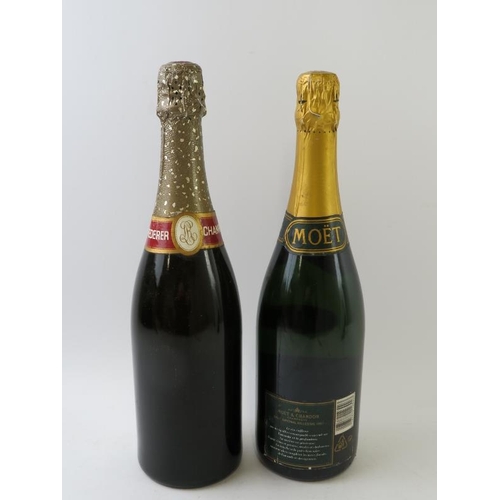 312 - 2 bottles: 1 bottle of Moet et Chandon 1995 vintage champagne, 75cl; 1 bottle of Louis Roederer Extr... 