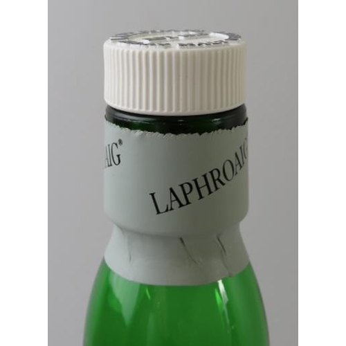 323 - 2 bottles: 1 litre bottle of Laphroaig single malt Scotch whisky, 100cl, 40% vol, 1990s bottling; 1 ... 