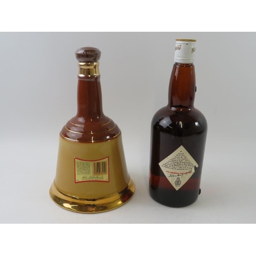 339 - 2 bottles: 1 bottle of Haig Gold Label Scotch whisky, 26 2/3 fl oz, 70 proof; 1 ceramic decanter of ... 