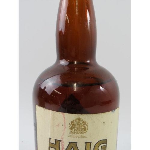 339 - 2 bottles: 1 bottle of Haig Gold Label Scotch whisky, 26 2/3 fl oz, 70 proof; 1 ceramic decanter of ... 