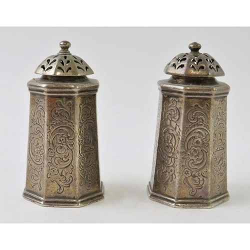 357 - A pair of Scottish silver cruets octagonal form with engraved decorated bodies, hallmarked for Edinb... 