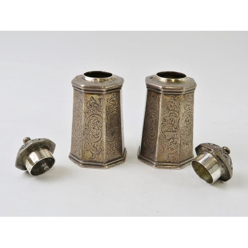 357 - A pair of Scottish silver cruets octagonal form with engraved decorated bodies, hallmarked for Edinb... 