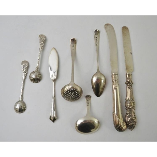 361 - Eight pieces of silver cutlery to include two silver bladed knives, a George III caddy spoon and sug... 