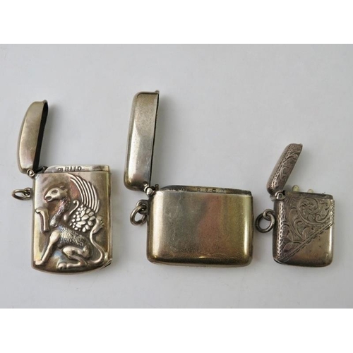 362 - Three late 19th/early 20th century silver vesta cases including one with griffin decoration, hallmar... 