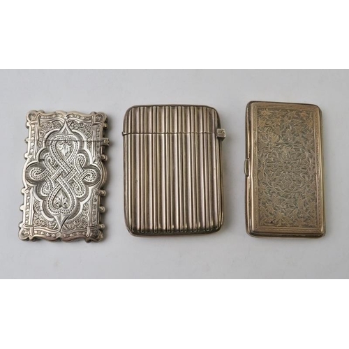 364 - Three Victorian silver card cases of various form. Two with ornate engraved decoration and one with ... 