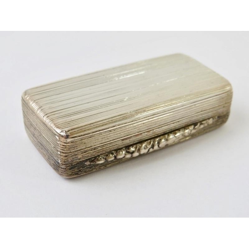 366 - A William IV silver vinaigrette of good size with gilded interior, reeded body and ornate floral gri... 