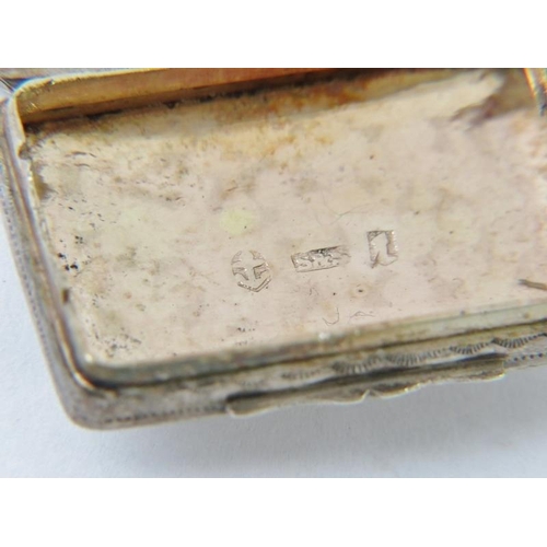 367 - A William IV silver vinaigrette of rectangular form with engraved decoration and ornate grille, hall... 