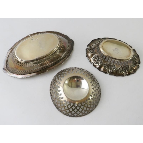 382 - Three late 19th/early 20th century pierced silver bon-bon dishes, various hallmarks and makers. Larg... 