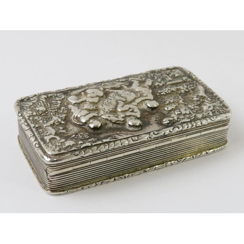 389 - A William IV/Victoria silver snuff box with lid depicting cherub and goat bacchanalian scene in reli... 