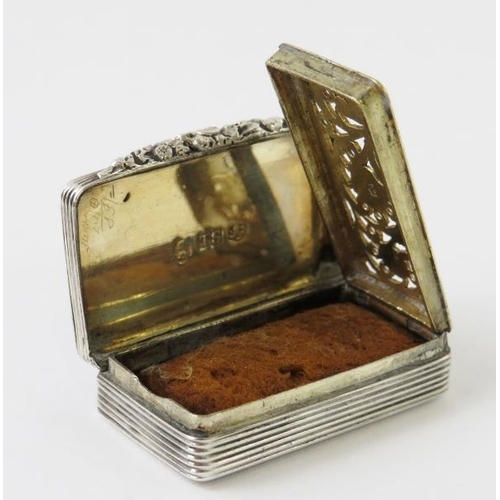 390 - A George IV silver vinaigrette with engraved exterior, gilded interior, floral and foliate grille, a... 