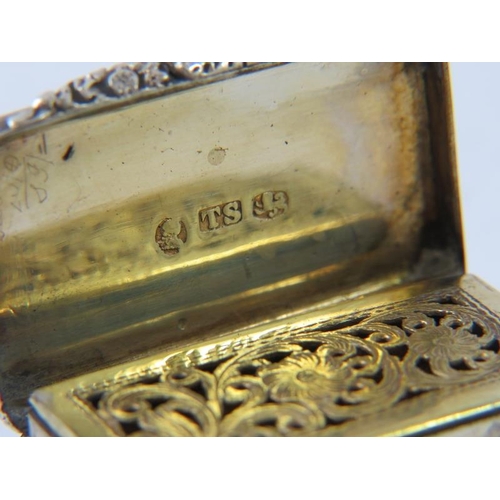 390 - A George IV silver vinaigrette with engraved exterior, gilded interior, floral and foliate grille, a... 