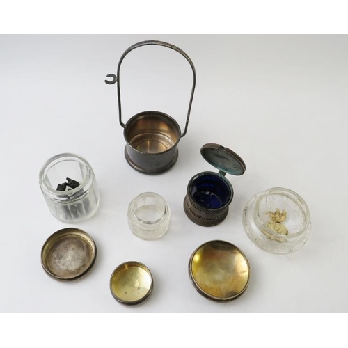 395 - A mixed lot of hallmarked silver items to include three silver topped glass jars, a mustard pot and ... 