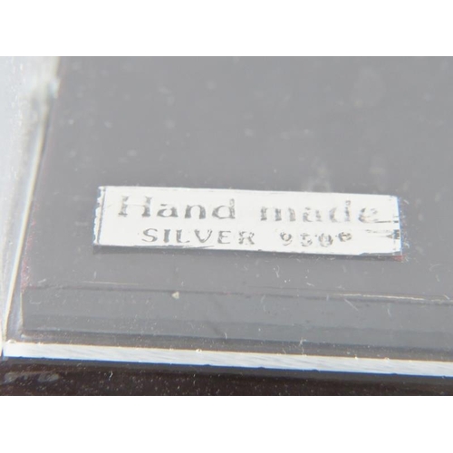 405 - A white metal model sail boat inscribed KAIKI and housed in a clear perspex case. Plaque stamped 'Ha... 