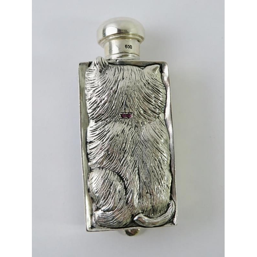 413 - An ornate figural Continental white metal double sided perfume bottle in the form of a cat with past... 