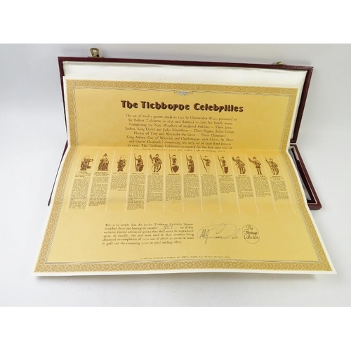 418 - A boxed set of 12 silver gilt figural Tichborne Spoons produced by The Heritage Collection. Each spo... 