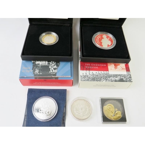 419 - Four proof British silver coins and an 1879 US Morgan Dollar restrike. Coins include 2020 75th anniv... 