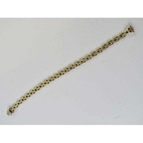 450 - A yellow metal lozenge chain link ladies bracelet, the clap marked K9. Length 20cm. Approx gross wei... 