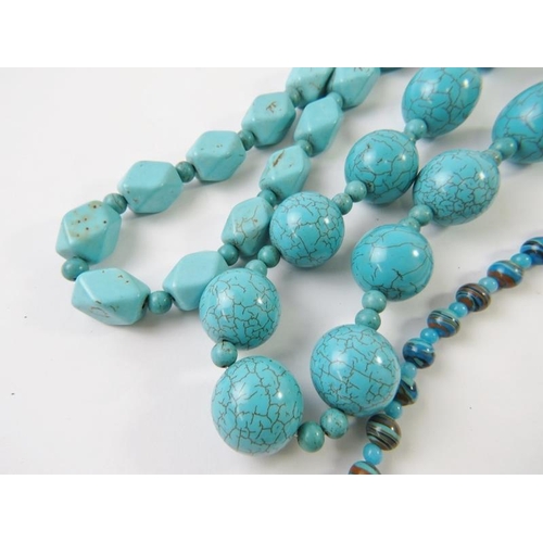 480 - A simulated turquoise bead necklace; and another similar; and another necklace with glass beads and ... 