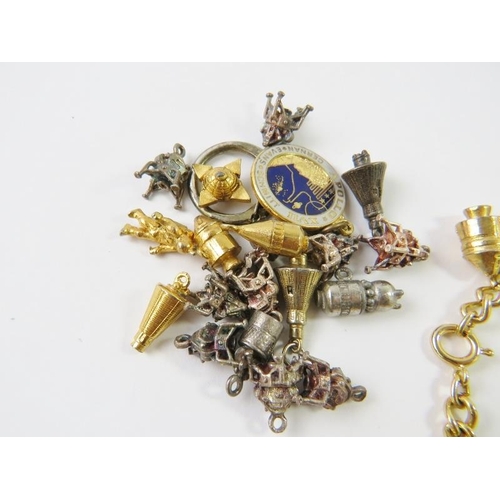 483 - Space interest: A collection of white silvery and gilt metal charms designed as satellites, rockets,... 