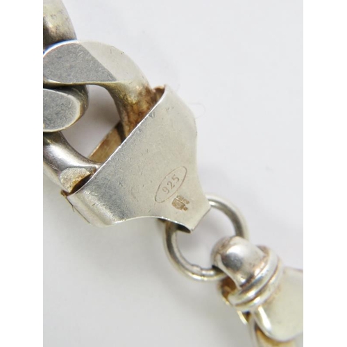 495 - A heavy silver retro flat curb link bracelet, marked 925 and bearing full import hallmarks. Overall ... 