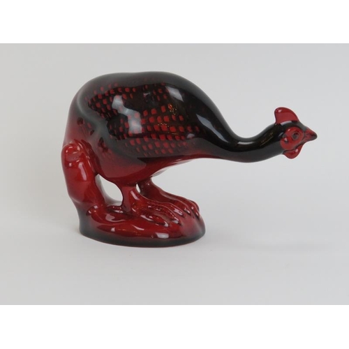 50 - A Royal Doulton flamBe glazed guinea fowl and hare. (2 items) 14 cm length, 10.8 cm length.
Conditio... 