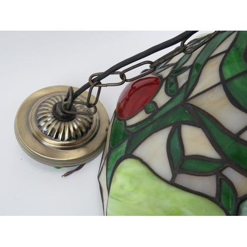 59 - A large modern Tiffany style coloured glass shade. cm diameter.
Condition report: Light age related ... 