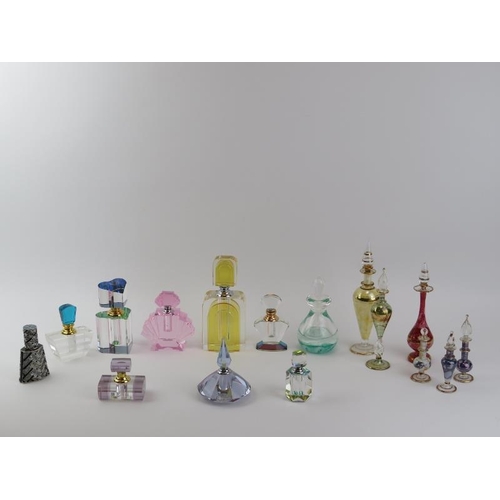 62 - A group of vintage perfume scent bottles, mid/late 20th century. Some modelled in the Art Deco style... 