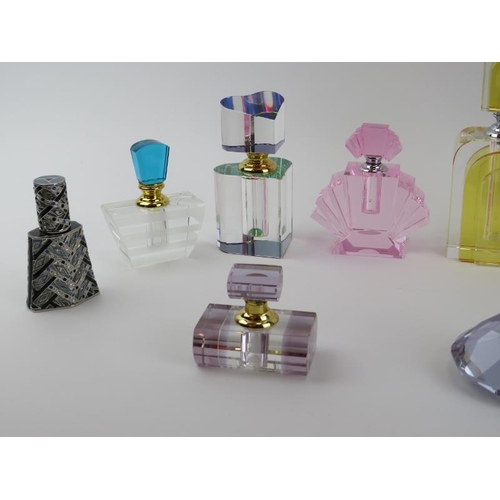 62 - A group of vintage perfume scent bottles, mid/late 20th century. Some modelled in the Art Deco style... 