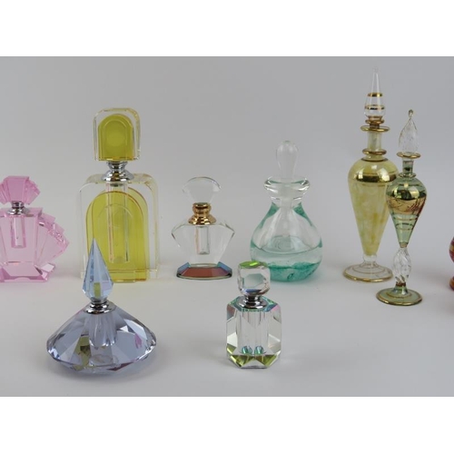 62 - A group of vintage perfume scent bottles, mid/late 20th century. Some modelled in the Art Deco style... 