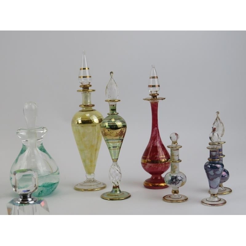 62 - A group of vintage perfume scent bottles, mid/late 20th century. Some modelled in the Art Deco style... 