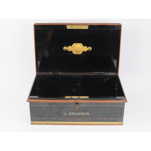 72 - An antique painted metal strong box by Chubb & Son’s of London, early 20th century. With gilt brass ... 