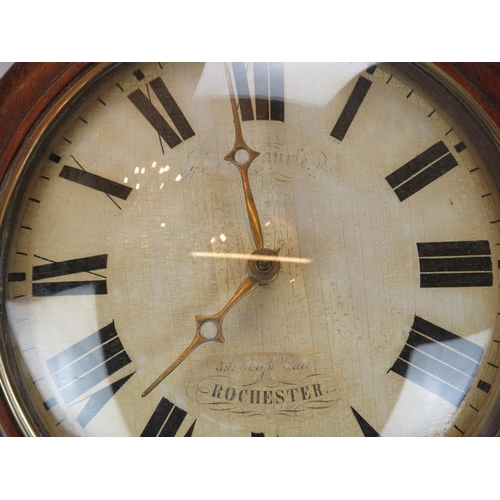 75 - A Victorian mahogany Postman's wall clock by S. Baurle of Rochester. With twin weights and pendulum.... 