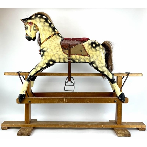 8 - A small dappled grey carved and painted wood rocking horse, early 20th century. With horse hair main... 