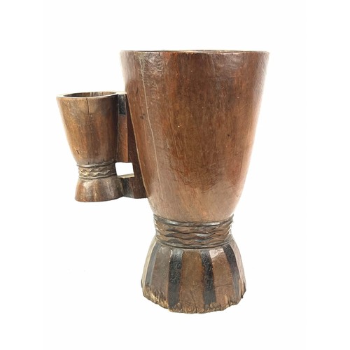 207 - A large African carved wood double mortar vessel, probably 20th century. 49.5 cm height. 
Condition ... 