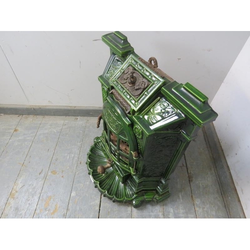 713 - An antique French green enamel inset multi-fuel stove. 
H59 x W53 x D44cms (approx)
Condition report... 