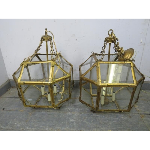 727 - A pair of gilt metal and glass faceted pendant ceiling lights by Visual Comfort & Co, each accepting... 