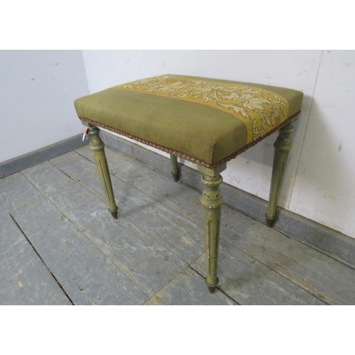 763 - A vintage French dressing stool, with orange tapestry seat, on reeded tapered supports with brass ca... 