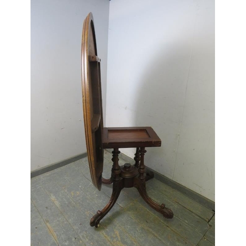 767 - A Victorian burr walnut oval loo table, the cross-banded top with marquetry inlay, on a cluster colu... 