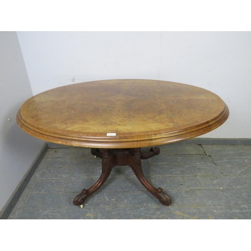 767 - A Victorian burr walnut oval loo table, the cross-banded top with marquetry inlay, on a cluster colu... 